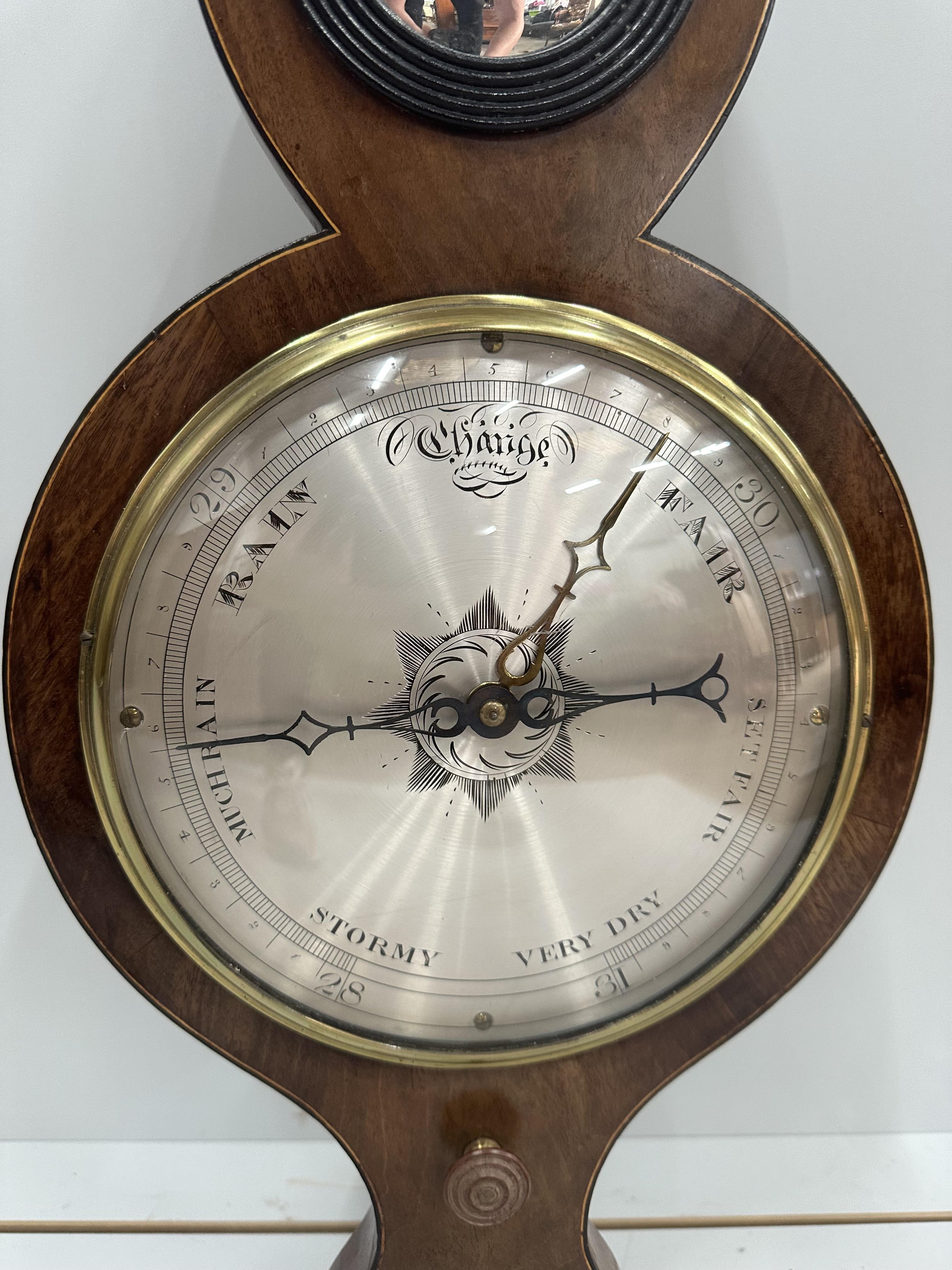 An early 19th century mahogany wheel barometer, height 98cm